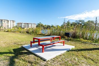 picnic table next to goodby creek on Mandarin Bay apartment complex grounds in Jacksonville, FL.
